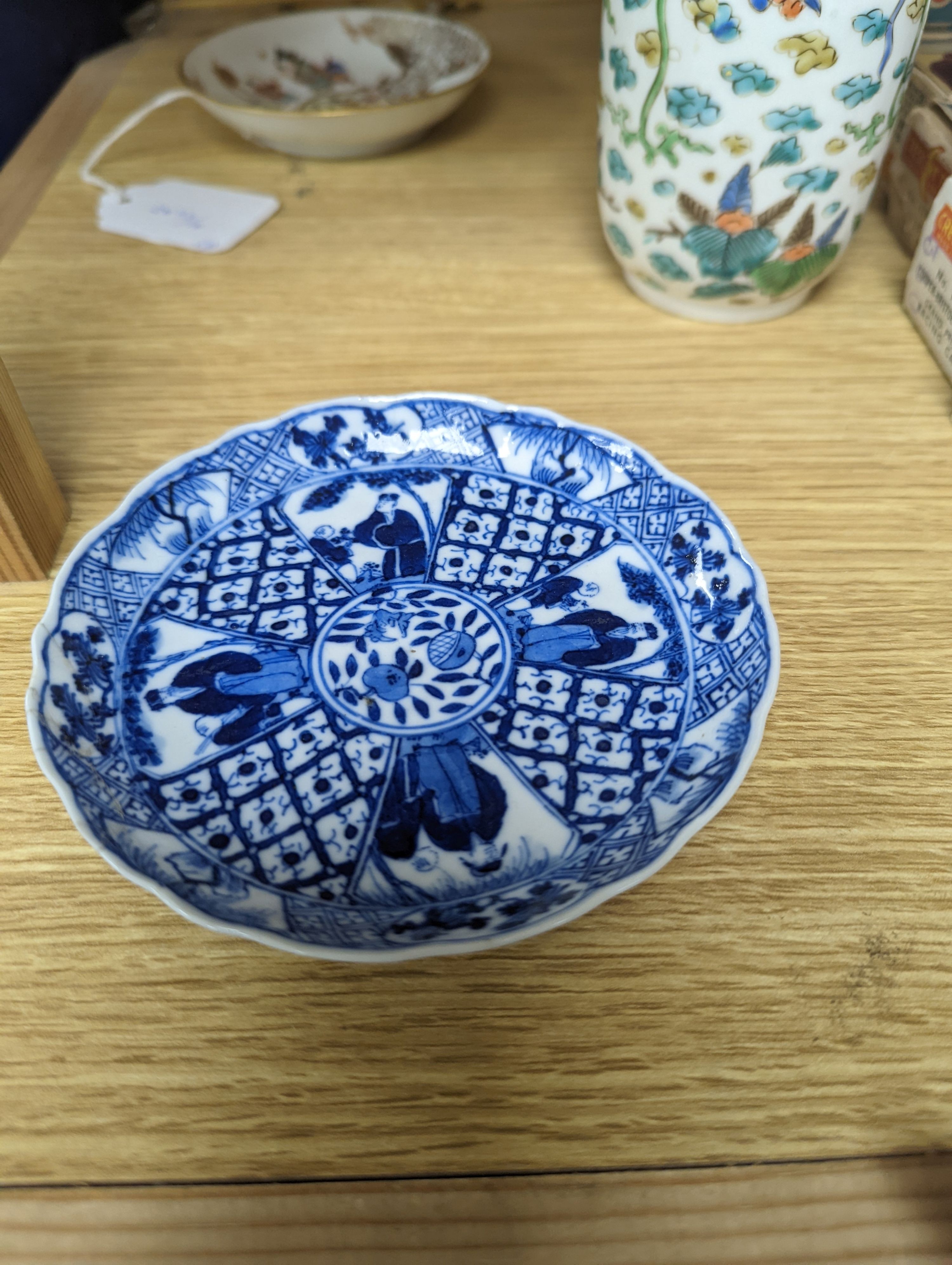 Two Chinese porcelain saucers, and a Chinese enamelled porcelain vase, 12.5cm., 18th century and later